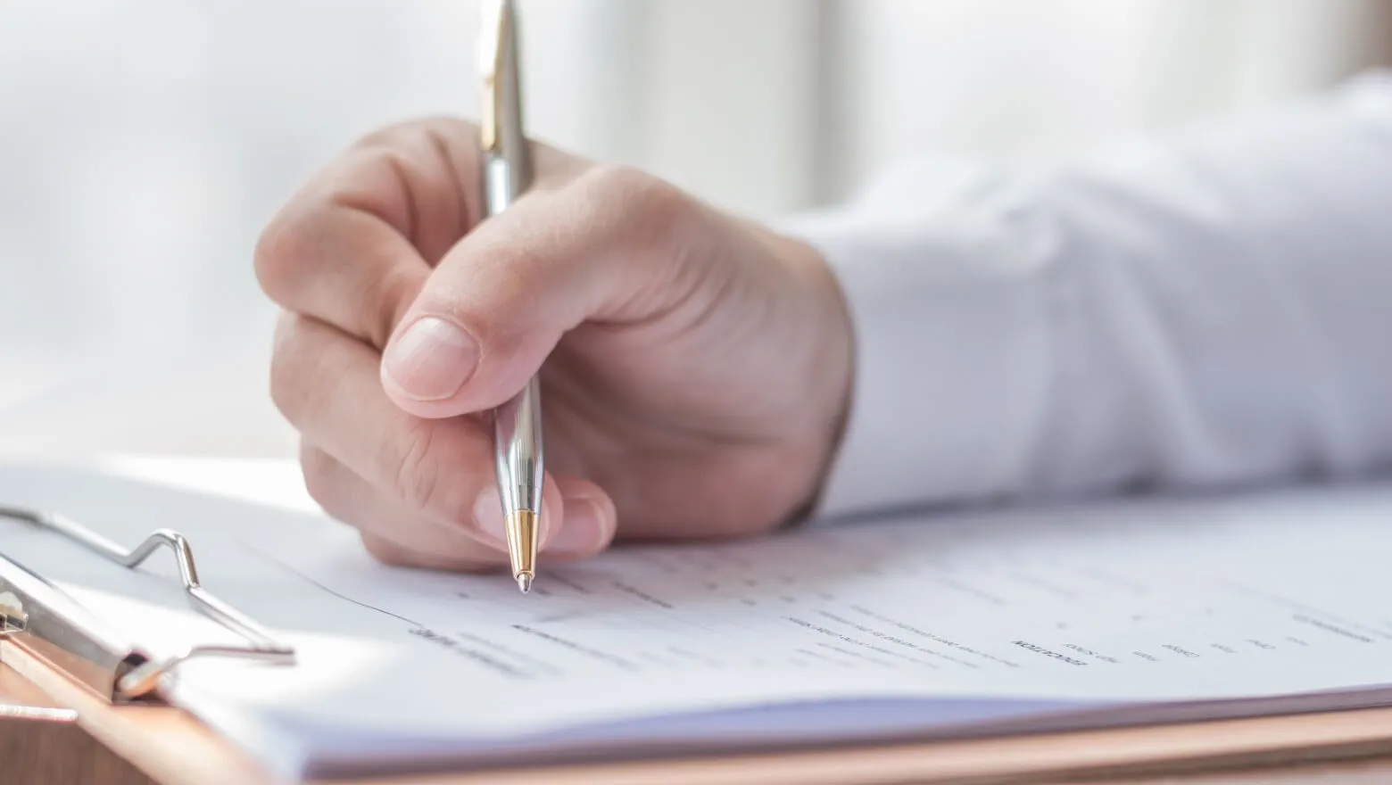 Private practice physician reviewing documents